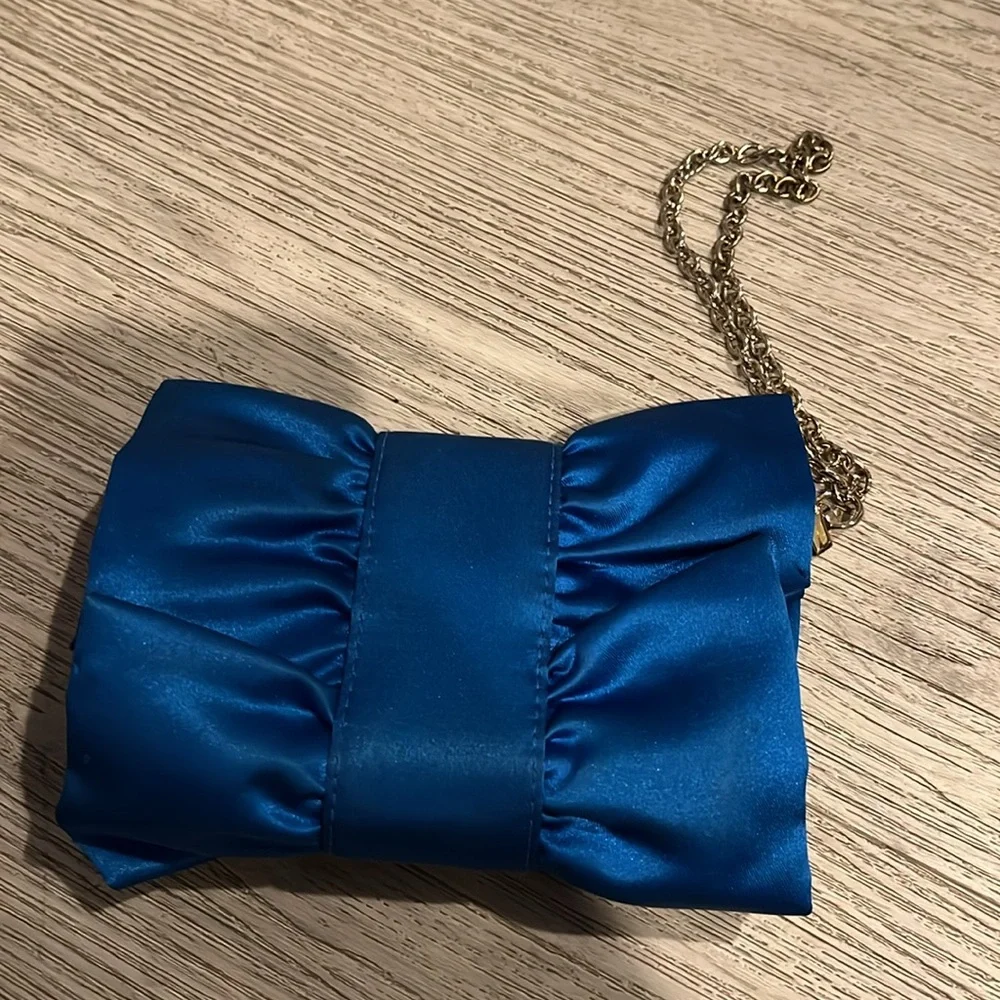 NWOT BCBG royal blue small clutch